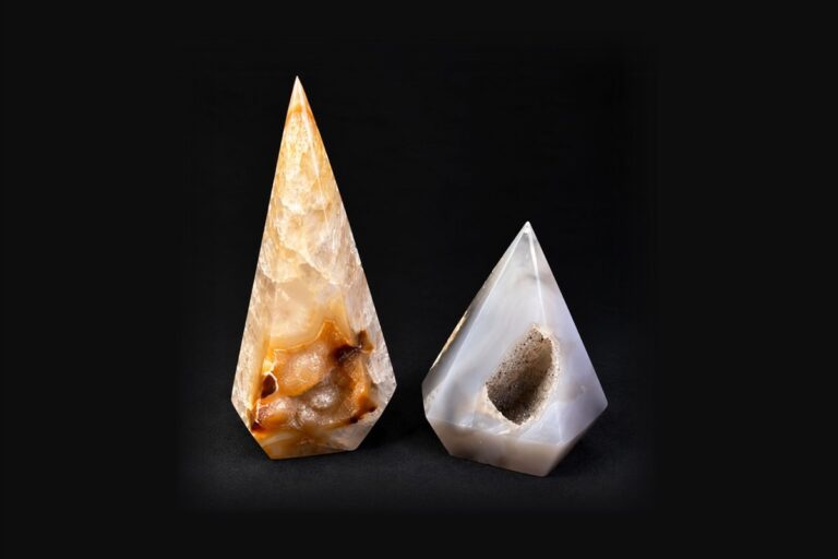 Two polished agate points, one with an open druzy cavity