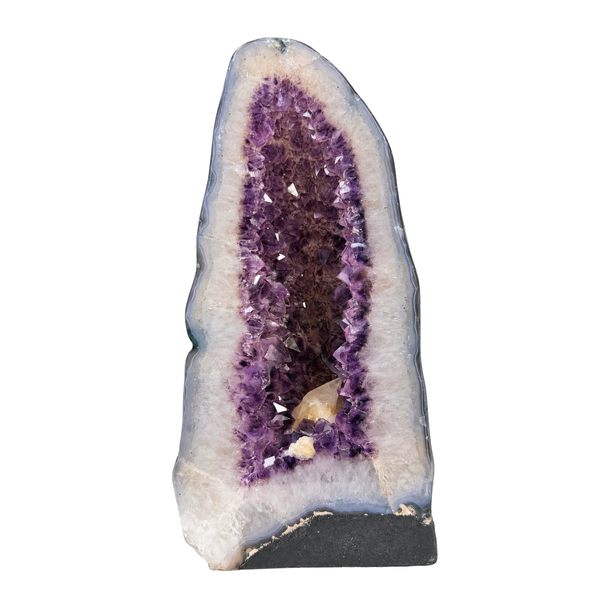 Polished amethyst cathedral with a calcite crystal inside the cavity